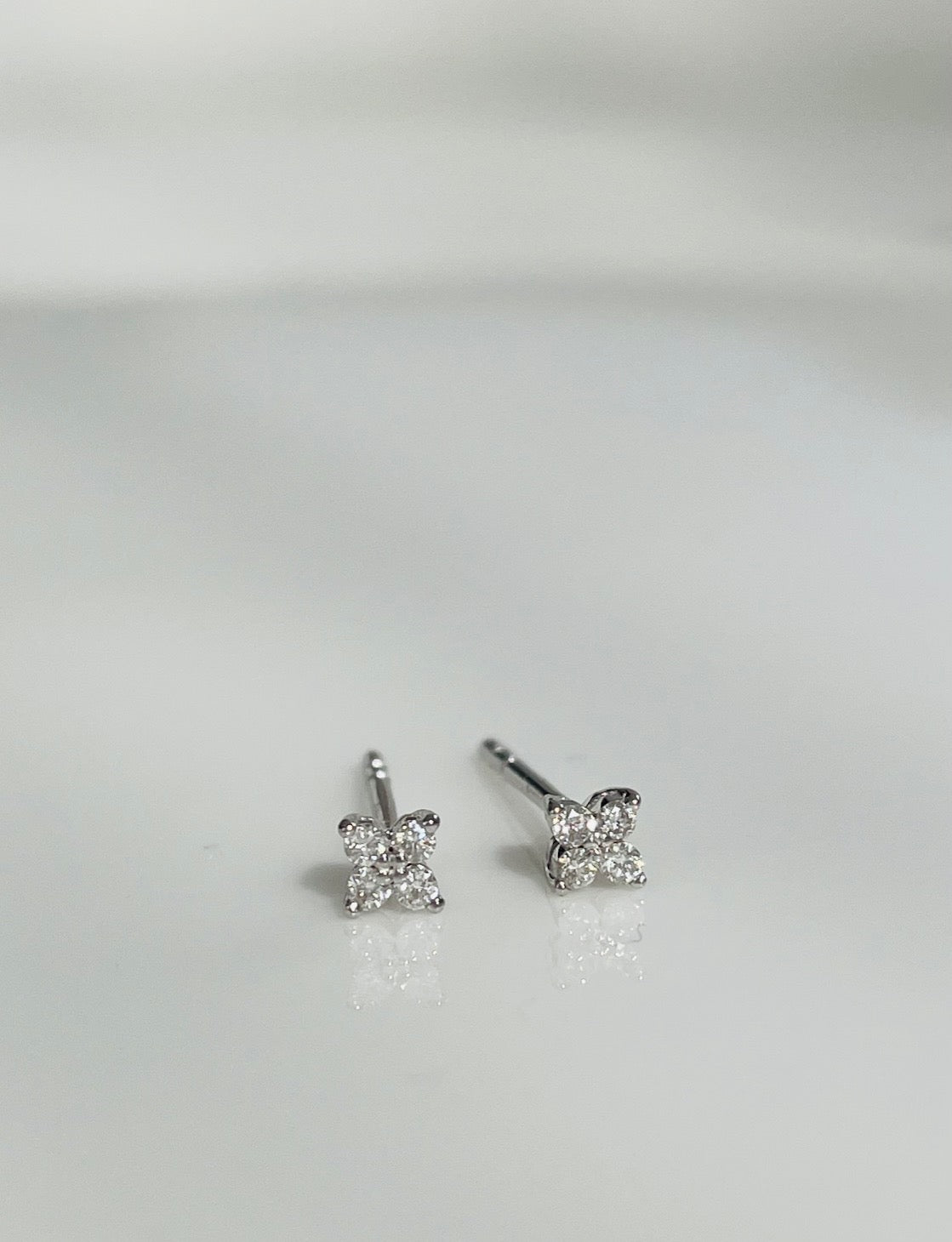 Long white gold deals earrings